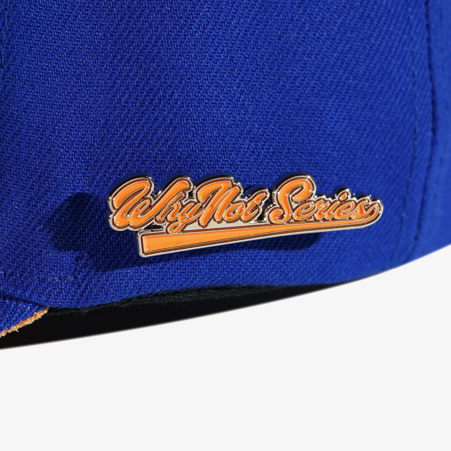 Whynot Series metal pins detail on blue snapback cap - tell them why not