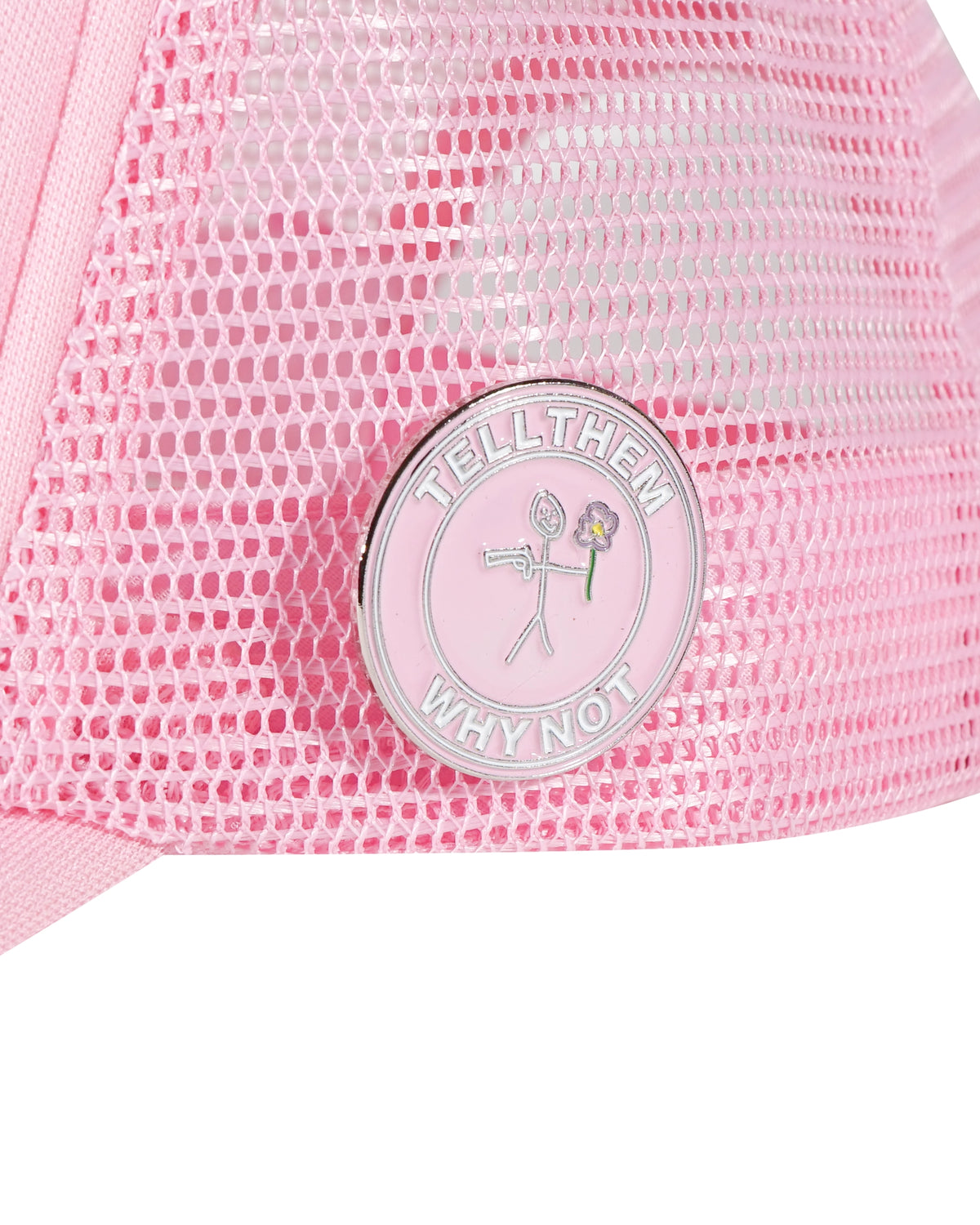 Whynot NY typography and left side pins detail on pink trucker cap