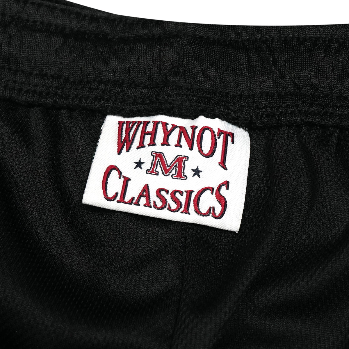 Black mesh stickman shorts label detail - Tell Them Why Not 