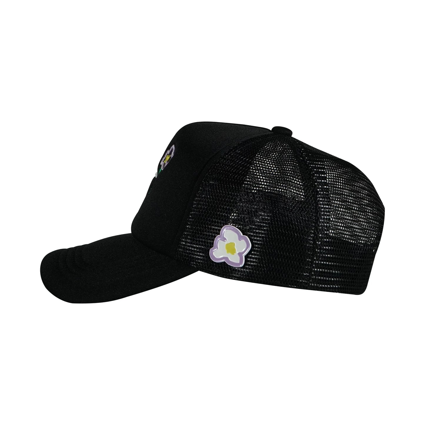 Black trucker cap left side view with pins flower