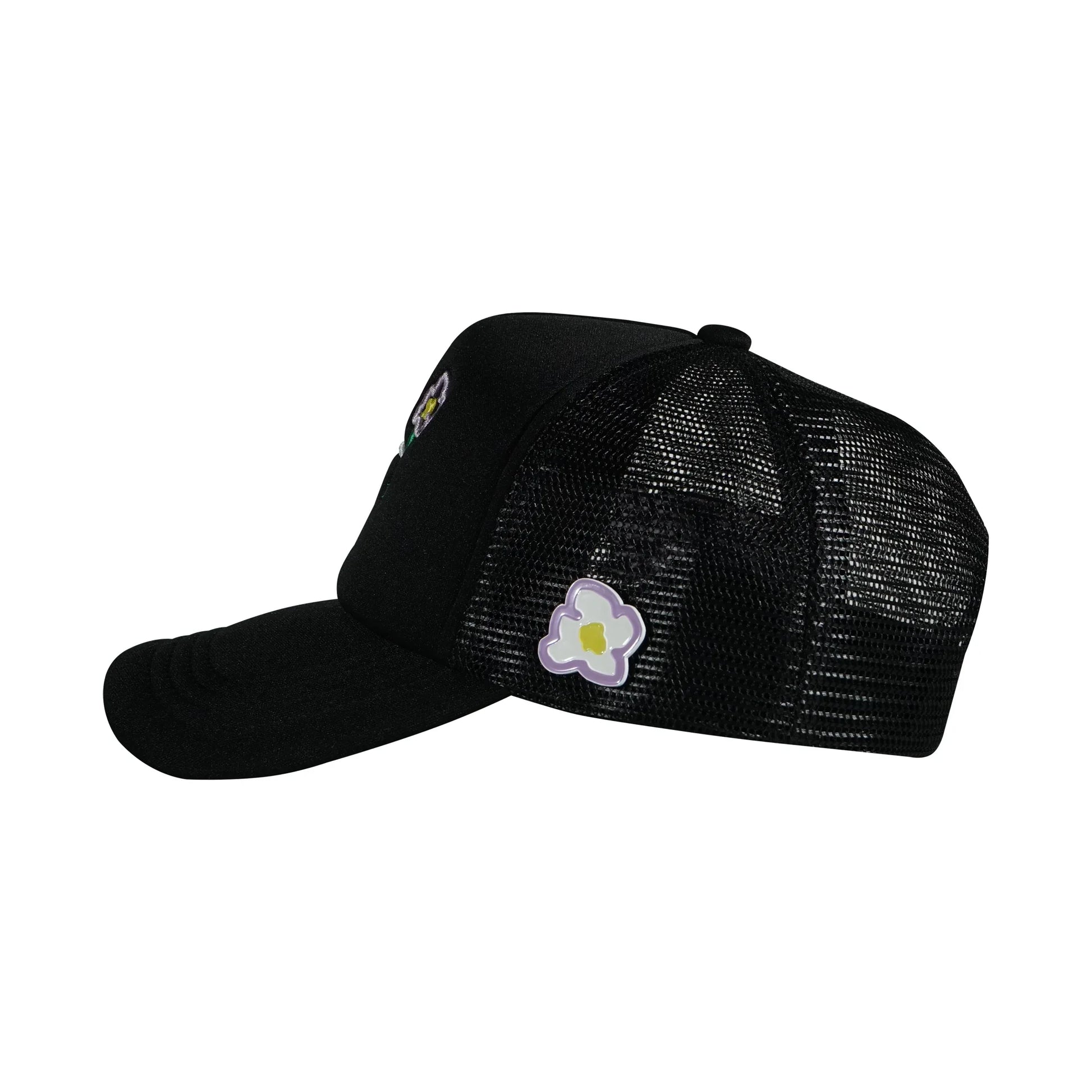 Black trucker cap left side view with pins flower