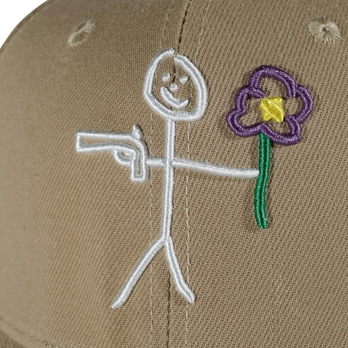 Embroidered stickman logo detail on camel snapback cap - tell them why not