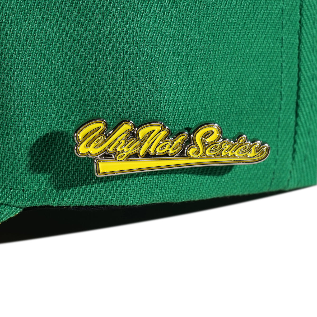 Whynot Series metal pins detail on green snapback cap - tell them why not