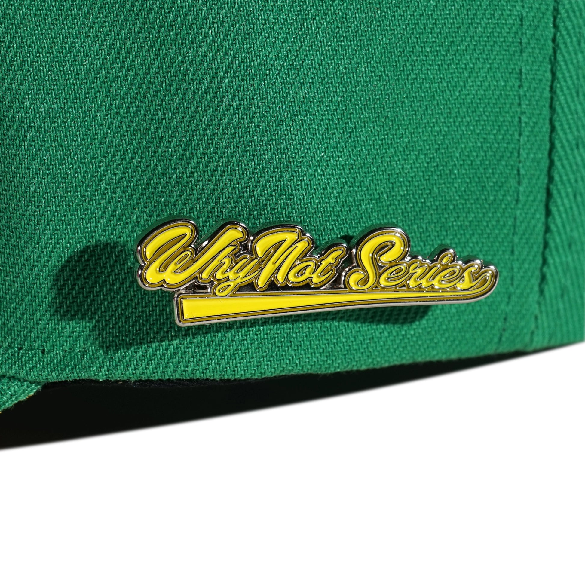 Whynot Series metal pins detail on green snapback cap - tell them why not