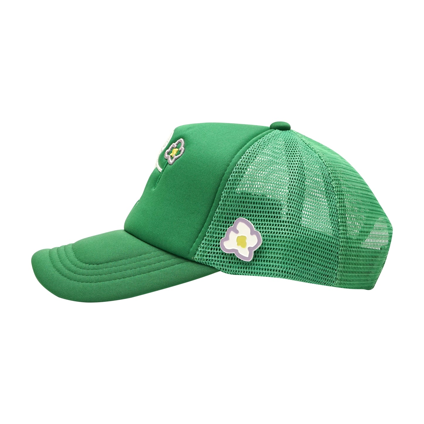 Green trucker cap left side view with pins flower