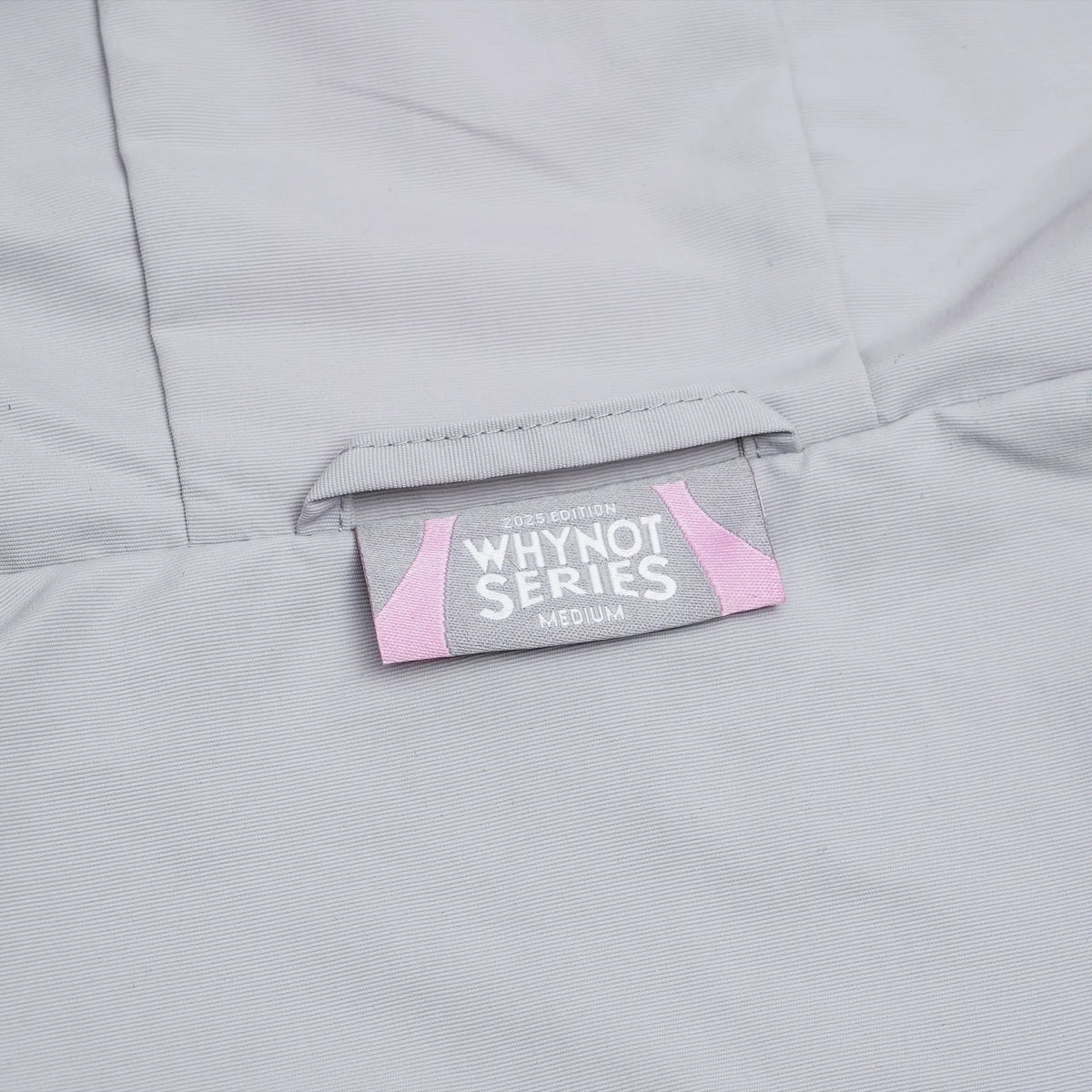 Grey nylon jacket Whynot Series label detail - tell them why not