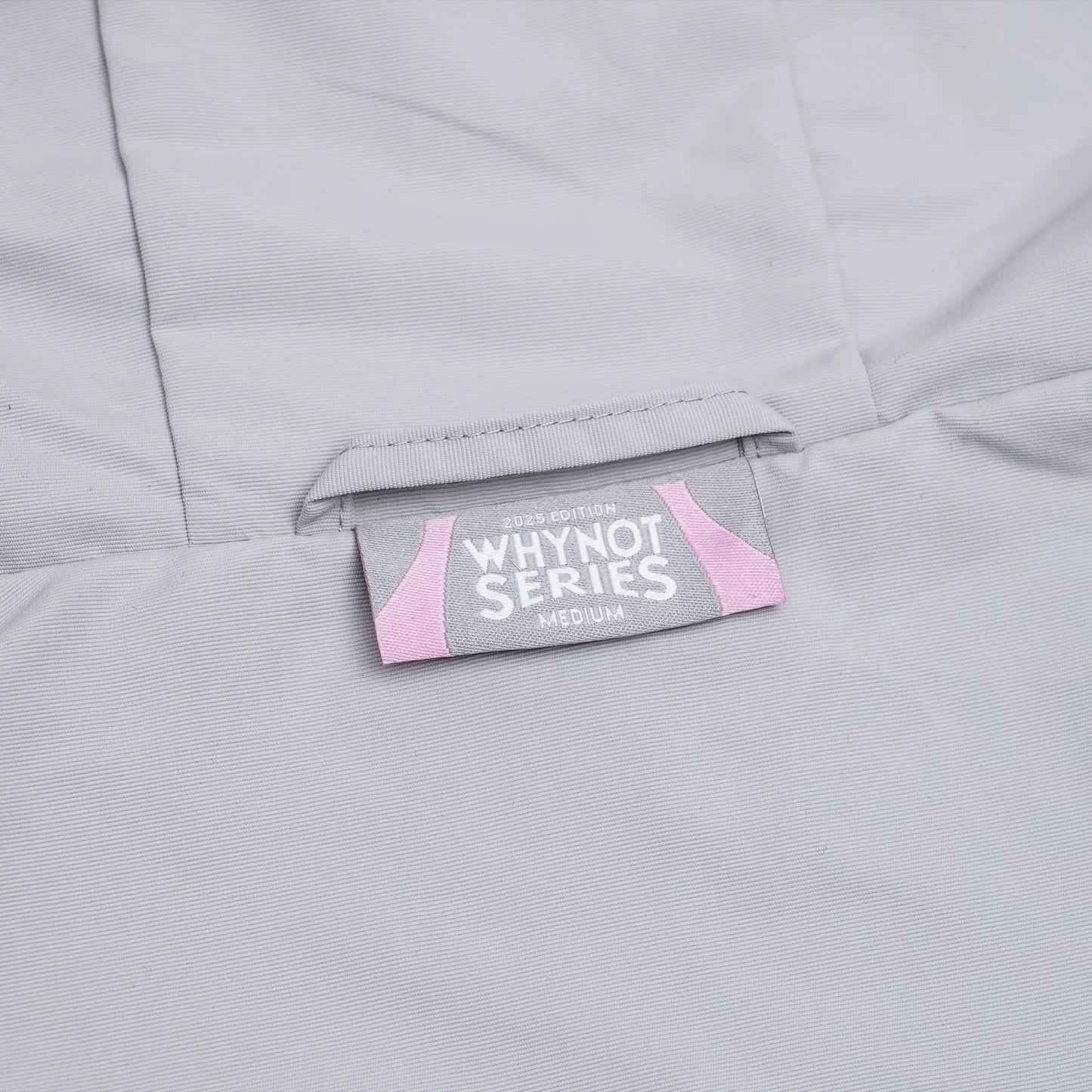 Grey nylon jacket Whynot Series label detail - tell them why not