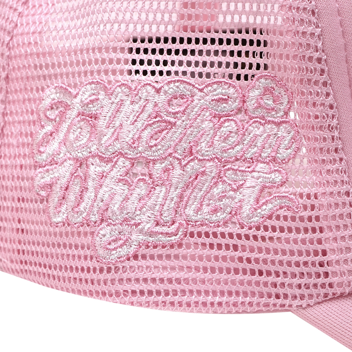 Embroidered typography right side detail on pink trucker cap