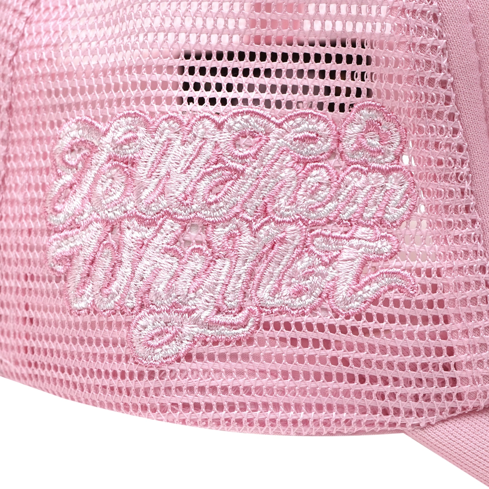 Embroidered typography right side detail on pink trucker cap