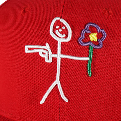 Embroidered stickman logo detail on red snapback cap - tell them why not