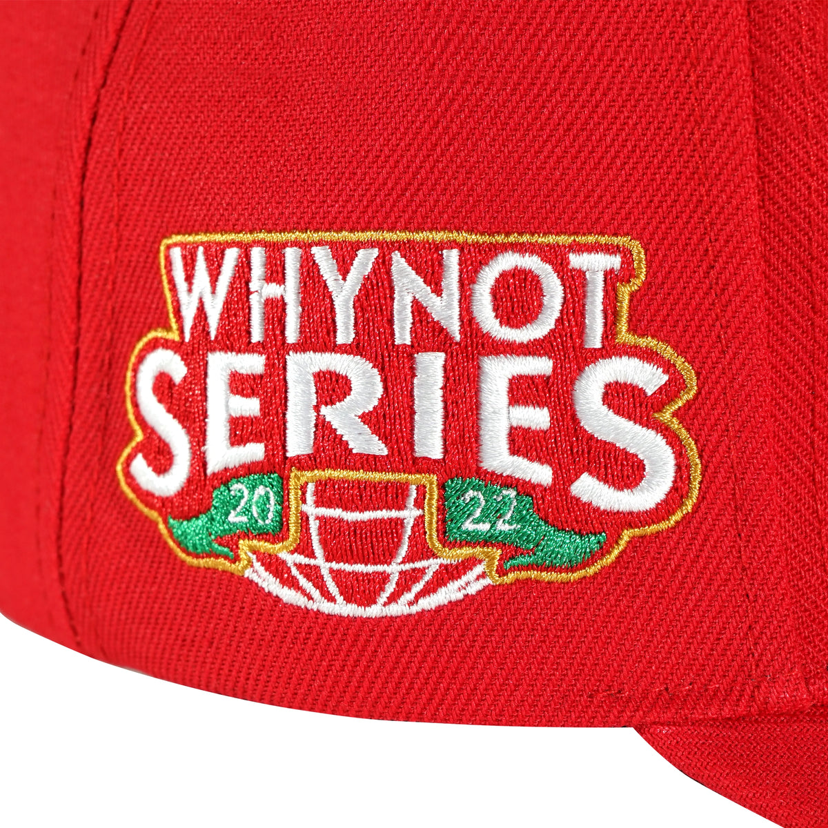 Whynot Series embroidered side detail on red snapback cap - tell them why not