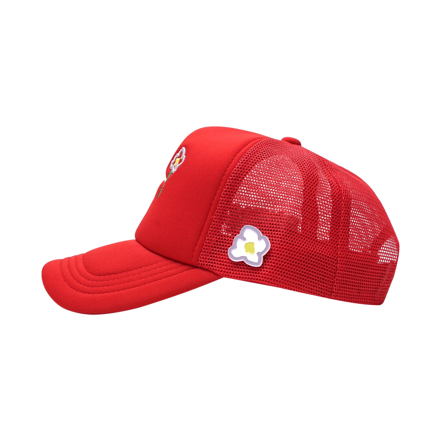 Red trucker cap left side view with pins flower