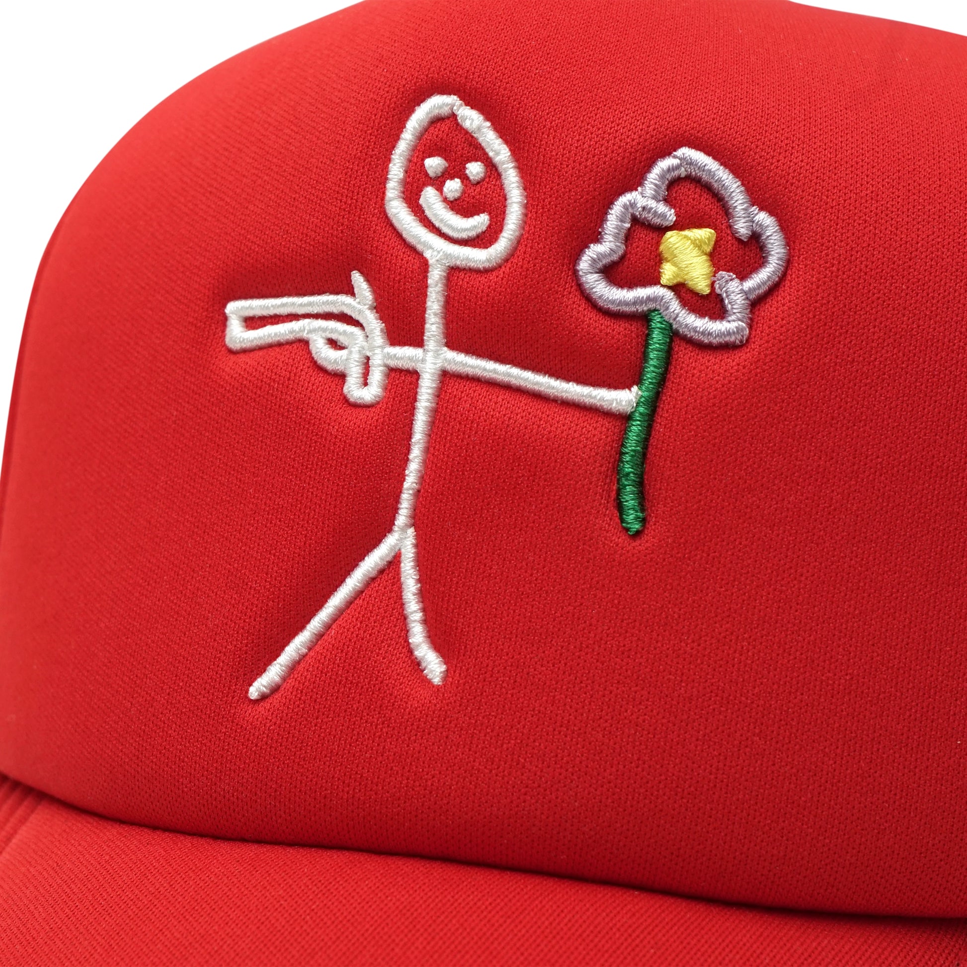 Embroidered stickman gun and flower logo front detail on black trucker cap