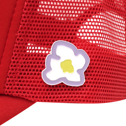 Left side flower pins detail on red trucker cap