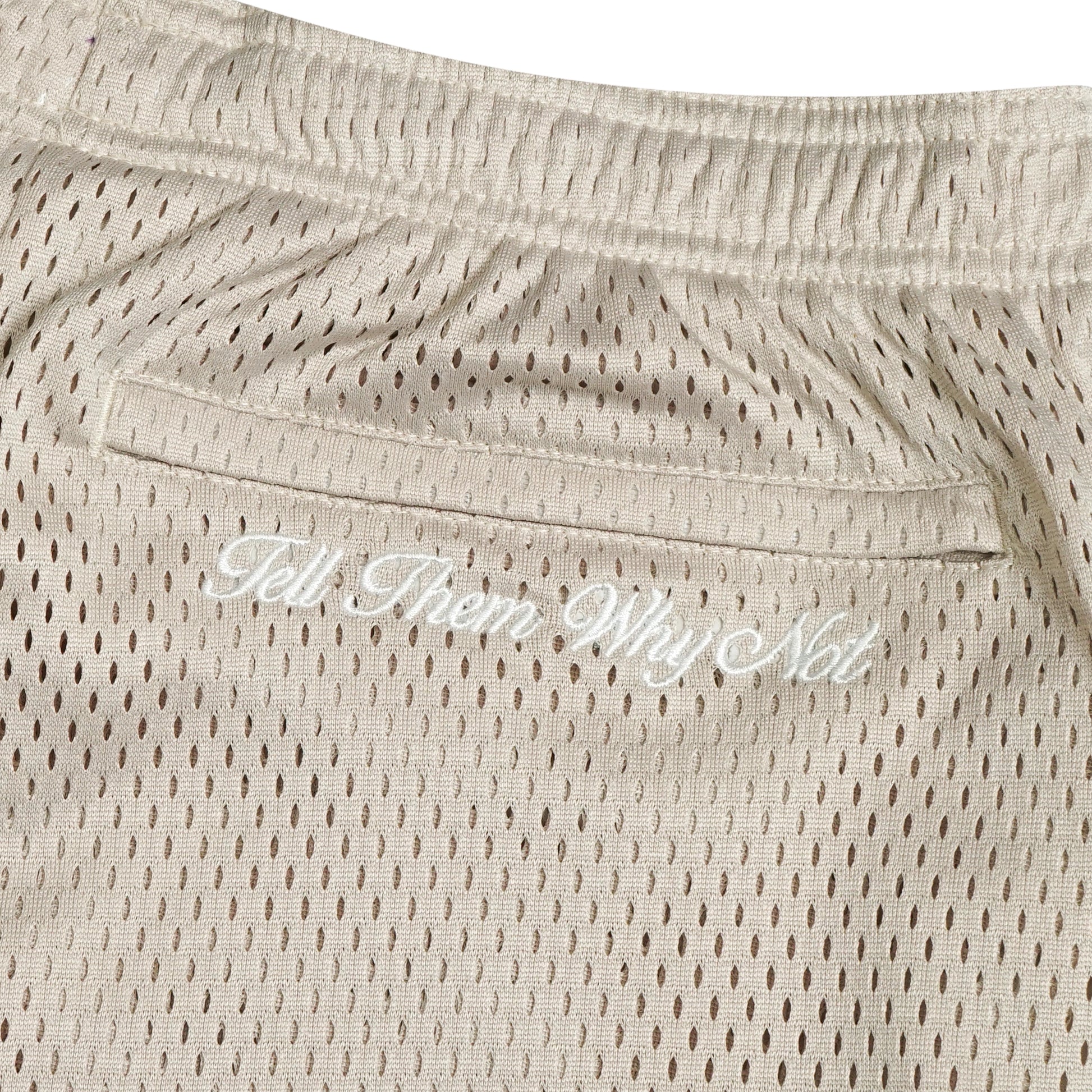 sand mesh stickman shorts back embroidery close-up - Tell Them Why Not